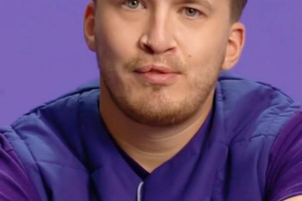 Dutch rapper snelle in a purple shirt against a purple background