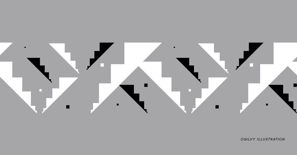 abstract illustration of white and black sharp diagonal lines intersecting against a gray background