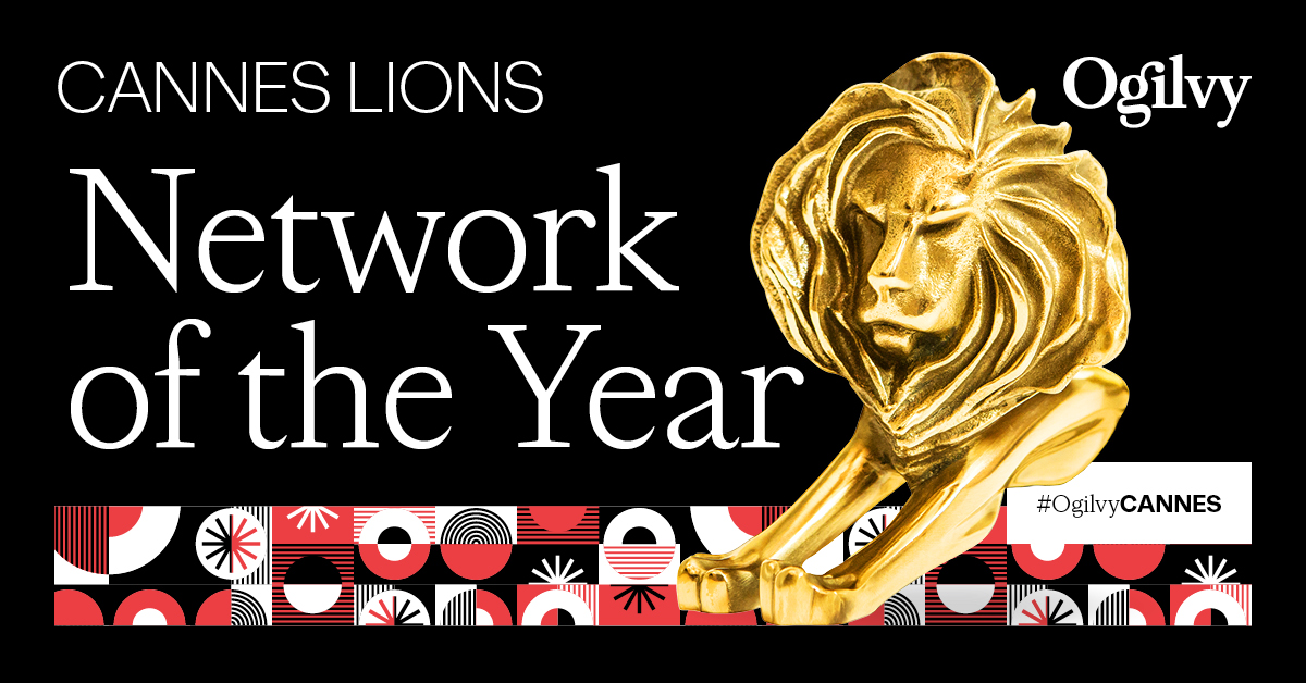 "Ogilvy named Cannes Lions Network of the Year, featuring the iconic gold lion trophy against a black background with a red and white geometric pattern border and the hashtag #OgilvyCANNES."