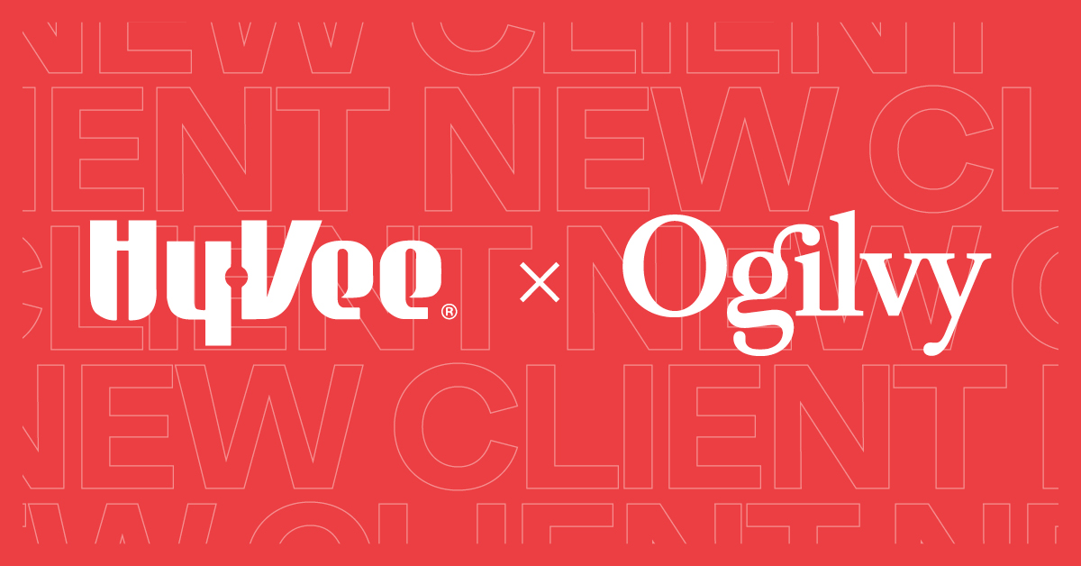Ogilvy and HyVee logos in white set against red background with 'new client' in white-outlined block letter 