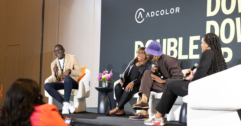 Ogilvy Global DE&I Director Shola Aminu speeaking on stage at ADCOLOR 2023