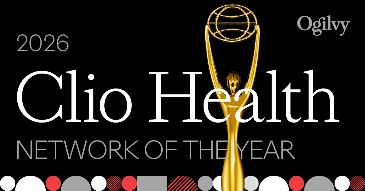 Ogilvy named 2026 Clio Health Network of the Year — a black award show graphic featuring the gold Clio statuette alongside the Ogilvy logo, with colorful medal icons along the bottom.