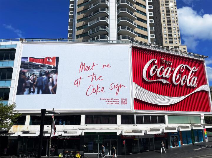 Meet Me at the Coke Sign — Coca-Cola Coca-Cola billboard outside King's Cross in Sydney. On the left is the ad "Meet me at the Coke Sign" and on the right is the classic billboard featuring the red and white iconic Coca-Cola logo