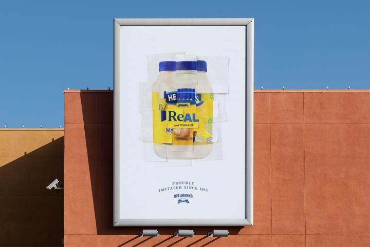 The Imitation Jar — Hellmann's Outdoor billboard showing Hellmann's mayo jar label made up of a collage of other blue and yellow mayo jar labels