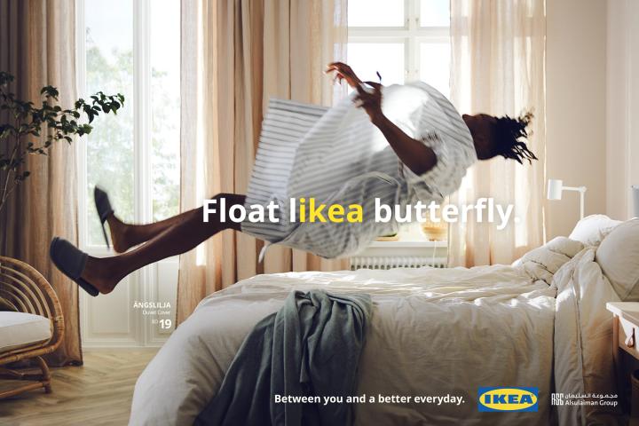 LIKEA — IKEA Person mid air about to fall back first onto a bed. with text overlay "Float likea butterfly" with "likea" in yellow