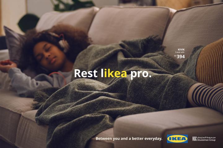 LIKEA — IKEA Woman asleep on a couch with text overlay "Rest likea pro" with "likea" in yellow