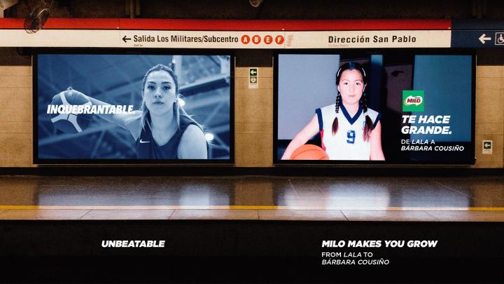 Raising Billboards - Milo Image of two billboards in a transit station. On one billboard is a Nike ad featuring a well-known athlete. On the other billboard is a MILO ad featuring that same athlete but as a child.