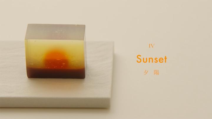 Edible Literature — Kameya Yoshinaga board with assorted wagashi. on the left the word "Sunset"