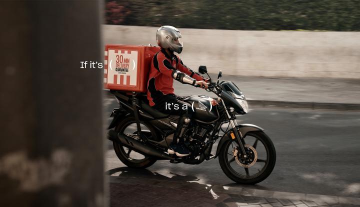 Honda Delivers — Al-Futtaim Trading Enterprises Honda Person on Honda motorbike making a delivery. Copy that says "If its: (your groceries in 30 minutes)" and "It's a" with parenthases marks around the Honda logo on the motorcycle