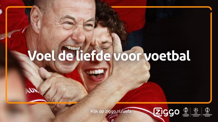 Experience the Love of Football Together — Ziggo Sport Man and woman celebrating at football match with text overlay "Voel de liefde voor voetbal"