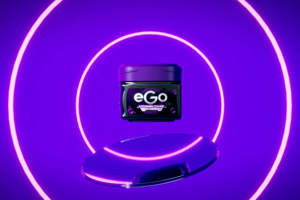 Purple product jar labeled “eGo Vitamin Care” floating against a neon violet background with glowing circular rings.