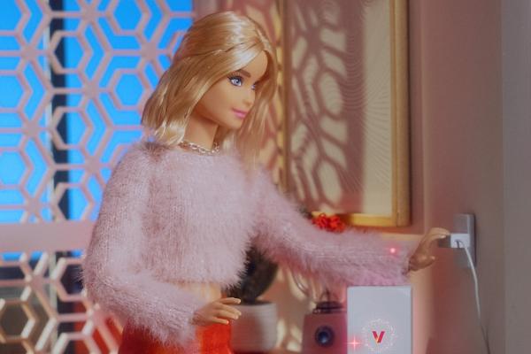 Barbie doll in Dreamhouse decorated for Christmas