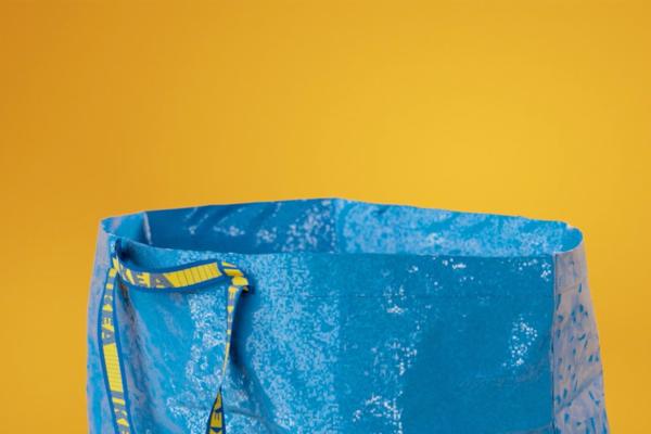 IKEA blue bag against a yellow background