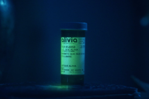 Prescription bottle label glowing in the dark