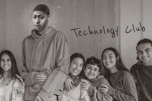 Old black and white photo of a young Anthony Davis in front of 5 other young people. "Technology Club" in handwritten black type 