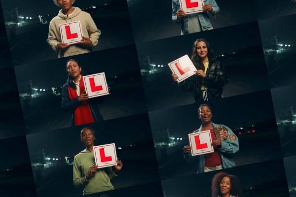 Diagonal collage of 6 people outside at night, holding up a white card with a red L on it