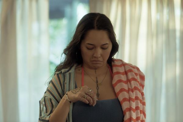 Woman doing a self breast check