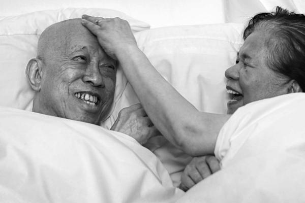 Man and woman embracing