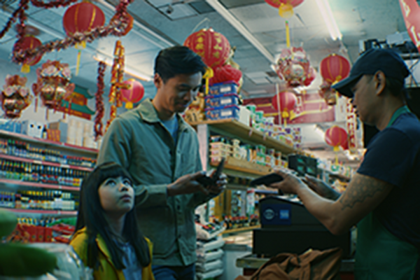 Man and child in supermarket