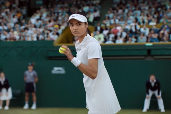 Tennis star Emma Raducanu plays tennis at Wimbledon